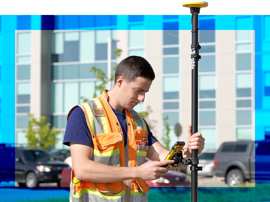 field worker using Trimble Catalyst DA2 antenna