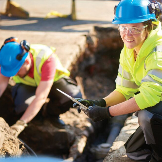 field workers recording subsurface data