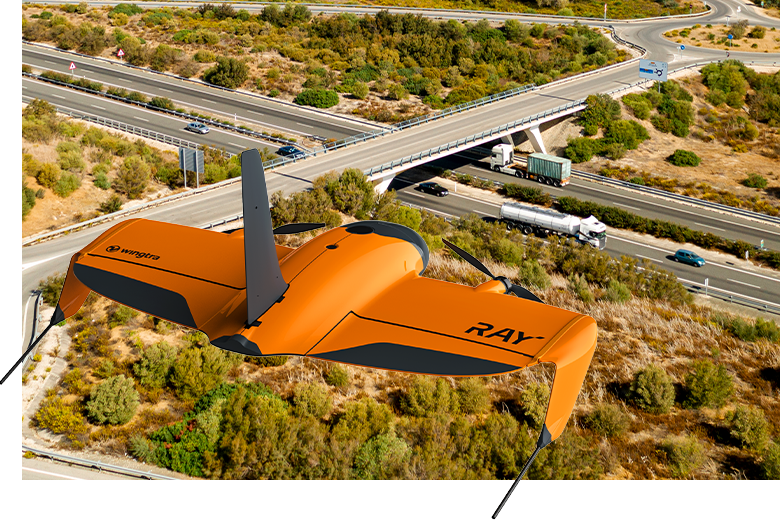 wingtraray flying over rural highway