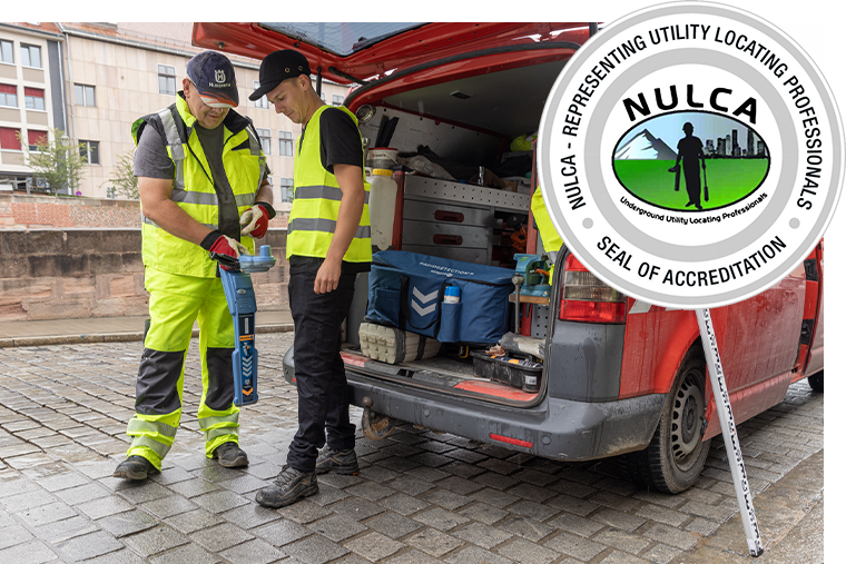 2 field workers inspecting underground assets