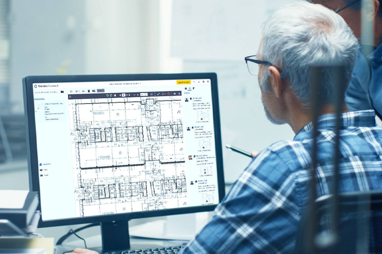 engineering looking at layout plans on computer screen